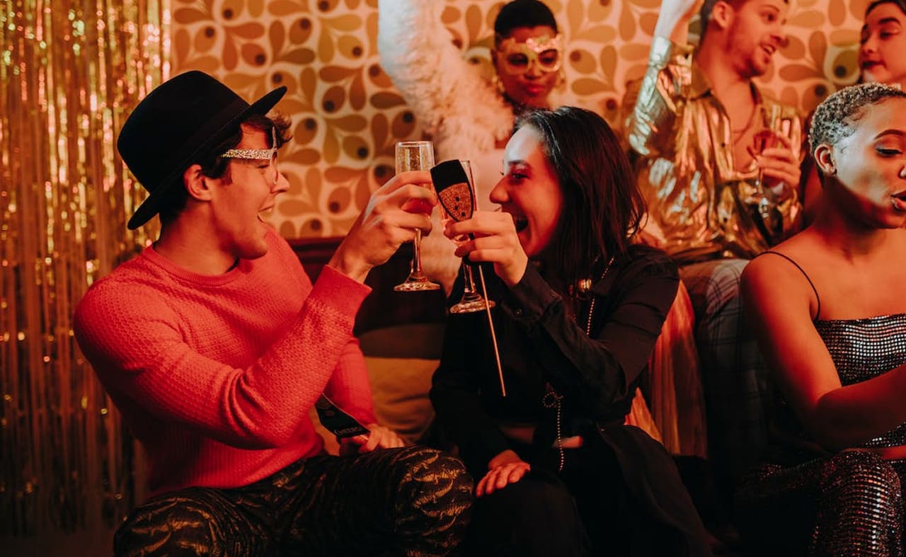 A group of people enjoying a party. image