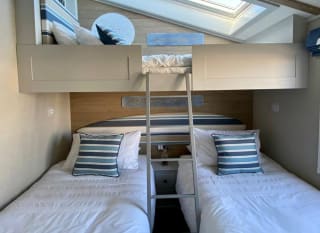 Twin bedroom with bunks at of one of our spacious static caravans in St Ives. Book your holiday now! image