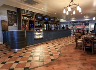 The interior of our on site restaurant at Golden Sands, The Sandpiper Restaurant & Sports Bar, image