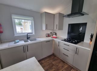 The kitchen area of one of our exclusive accommodations, The Seaview Lodge. Book your holiday now! image