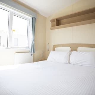 Comfortable double bed with pillows & linen included