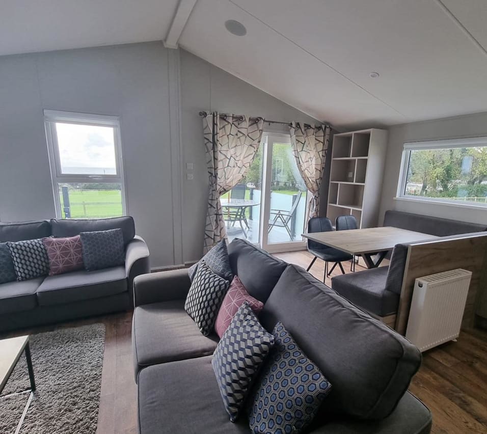 The living and lounge area of one of our exclusive accommodations, The Seaview Lodge. Book your holiday now! image