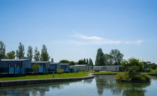 Lodges that are located lakeside at our holiday park Mill Rythe, Hampshire. image