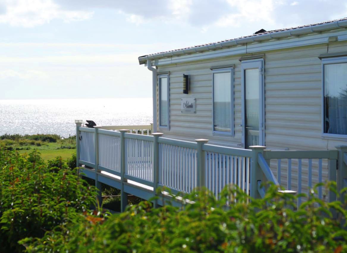 One of our classic holiday homes looking out to sea at our Essex holiday park, Mersea Island. image
