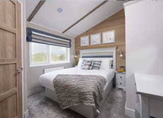 The double bedroom of one of our spacious static caravans in St Ives. Book your holiday now! image