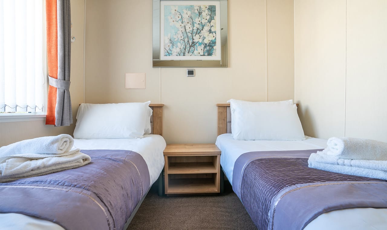 The twin bedroom at our Exclusive Rooftop Lodge. Book your holiday now! image