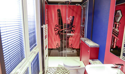 The shower and bathroom of one of our exclusive accommodations, The Rockstar. Book your holiday now! image