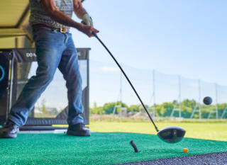 A man on the driving range at Appletree. image