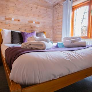Comfortable double bed with pillows & linen included