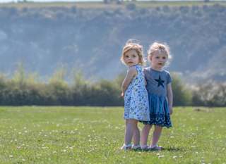Children playing besides Whitecliff Bay views image