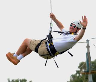 A man enjoying the zip wire activity at Tattershall Lakes.