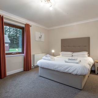Comfortable double bed with pillows & linen included