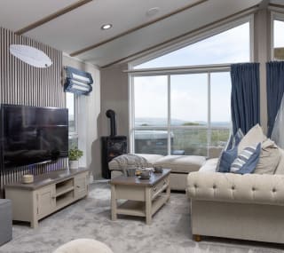 The living area of one of our spacious static caravans in St Ives. Book your holiday now! image