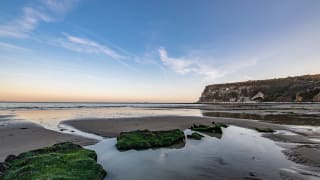 Dawn breaking over the beach at Whitecliff Bay. One of our stunning locations in the Isle Of Wight