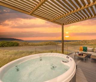 The hot tub at our stunning accommodation at our holiday park St Ives Bay with stunning sea views.