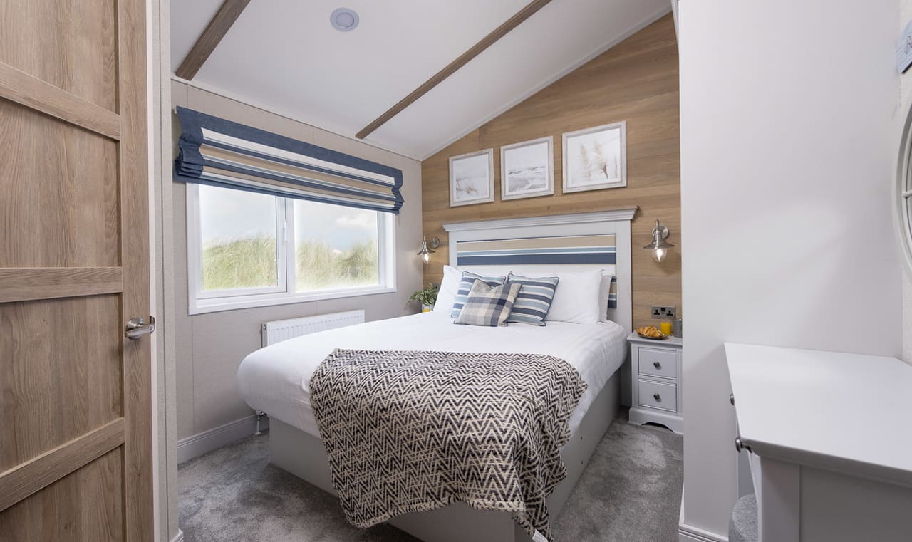 The double bedroom of one of our spacious static caravans in St Ives. Book your holiday now! image