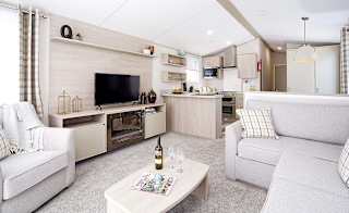 The lounge area of one of our static holiday homes. image