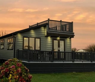 One of our lodges avalable to stay in. A beautiful sunset behind the lodge during the Autumn months.