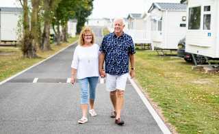 A couple enjoying a walk on one of our parks. image