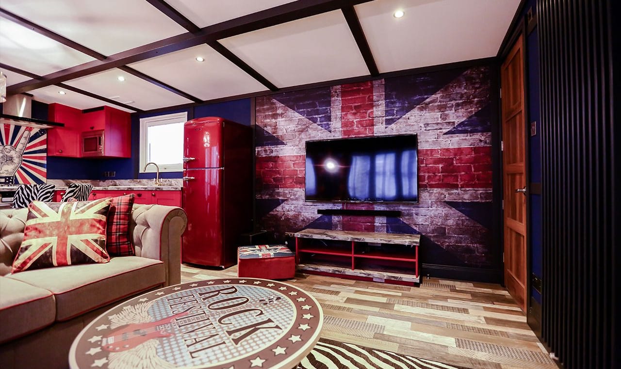 The lounge area of one of our exclusive accommodations, The Rockstar. Book your holiday now! image