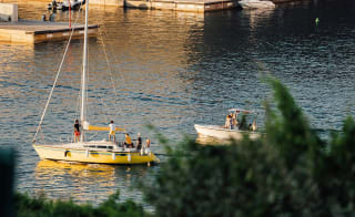 10. Sailing or kayaking on the water image