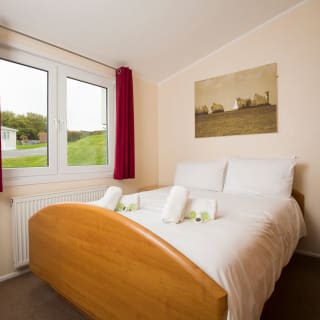 Comfortable double bed with pillows & linen included