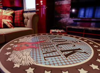 The living room table at one of our exclusive accommodations, The Rockstar. Book your holiday now! image