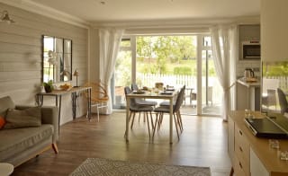 The lounge area of our bright and spacious luxury island cottage. The perfect way to stay. image