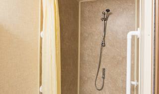 The shower of our accessibility adapted static caravan. The perfect way to stay. image