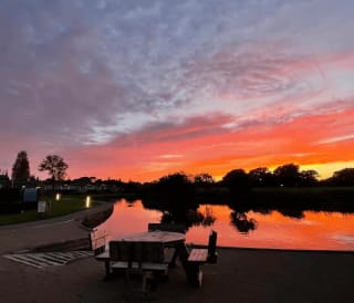 The beautiful sunset orange sky across our Mill Rythe Holiday Park.