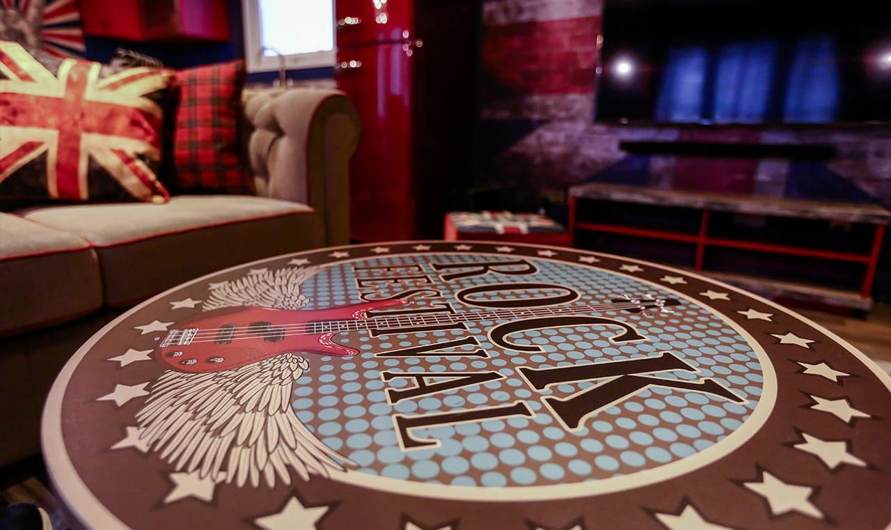 The living room table at one of our exclusive accommodations, The Rockstar. Book your holiday now! image