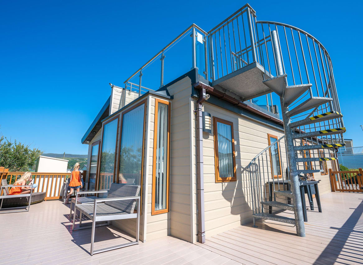 The exterior of one of our bright and spacious Exclusive Rooftop Lodge at our stunning park in North Wales, Barmouth Bay. Book your break today! image