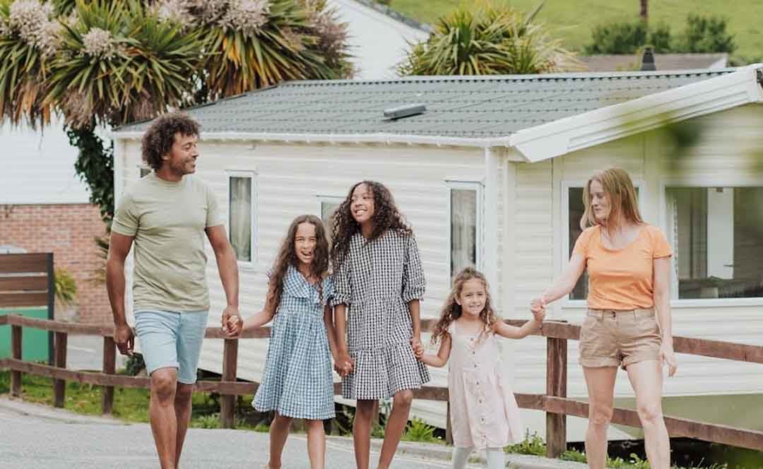 Family walking around our Newquay Bay Holiday Park. image