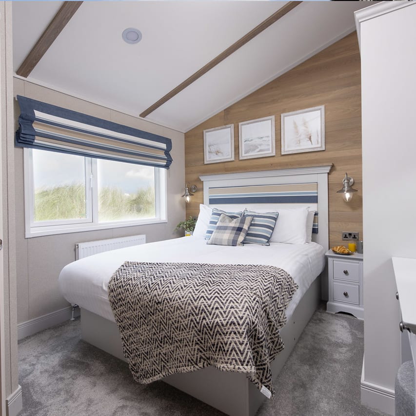 The double bedroom of one of our spacious static caravans in St Ives. Book your holiday now!