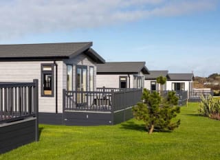 Our lodges we have at Newperran Bay holiday park. image