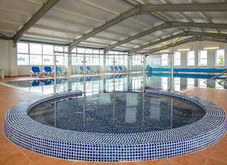 The indoor swimming pool at Newperran Holiday Park, Cornwall. image
