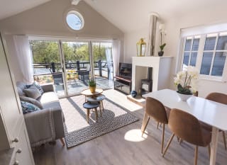 The lounge area of The Lakehouse at The Lakes Rookley. The perfect way for the family to stay. image