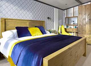 The double bedroom of one of our exclusive accommodations, The TriBeCa. Book your holiday now! image