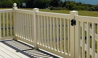 The decking area on a sunny day at one of our exclusive accommodations, The Seaview Lodge. Book your holiday now! image