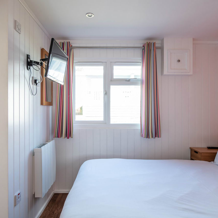Comfortable double bed with pillows & linen included