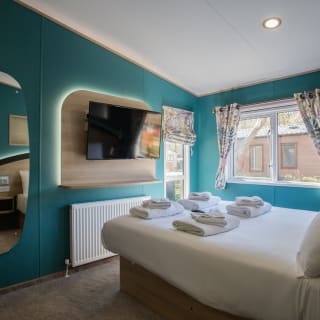 Comfortable double bed with pillows & linen included