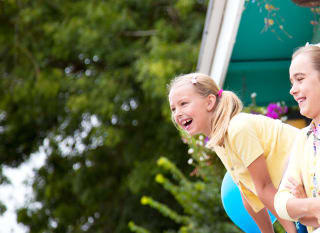 A young girl enjoying herself at our holiday park. image