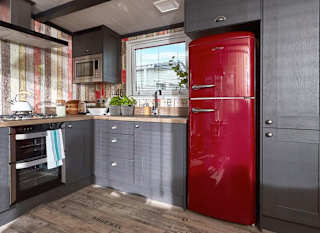 The kitchen area of one of our exclusive accommodations, The TriBeCa. Book your holiday now! image
