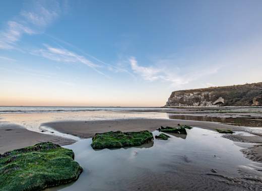 Dawn breaking over the beach at Whitecliff Bay. One of our stunning locations in the Isle Of Wight