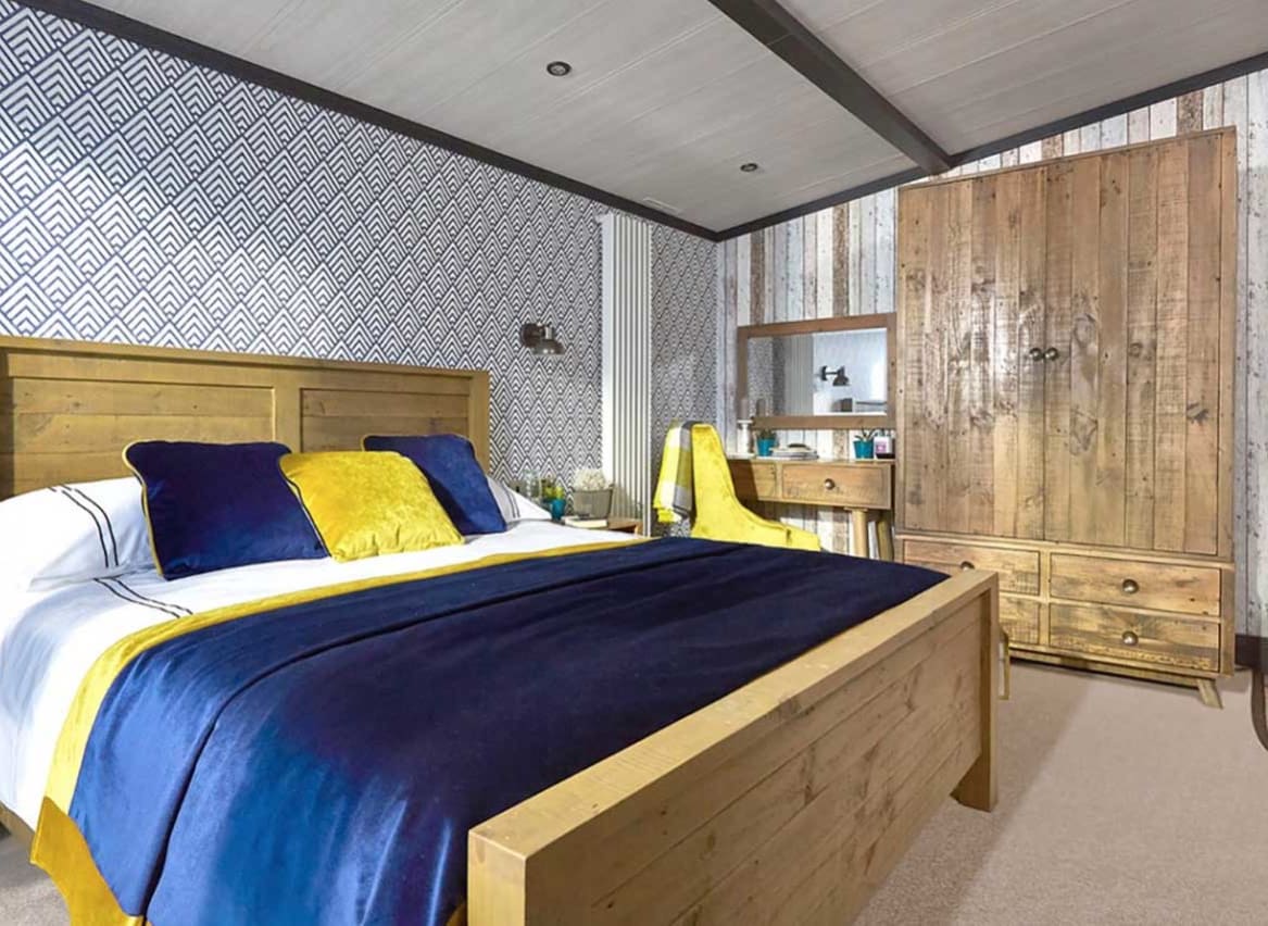 The double bedroom of one of our exclusive accommodations, The TriBeCa. Book your holiday now! image
