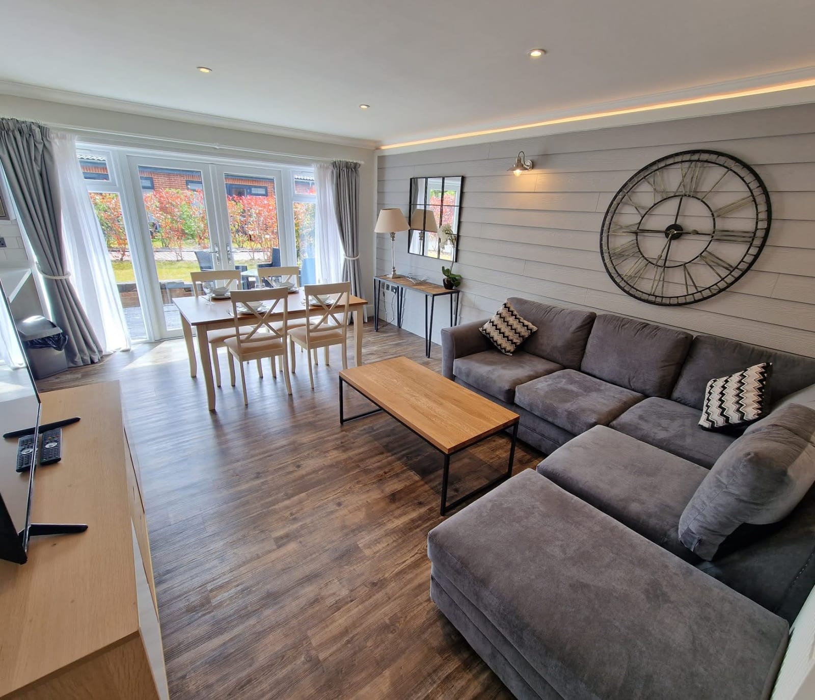 The lounge area of our stunning holiday home at The Lakes Rookley, the Island Cottage.