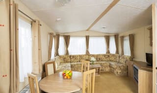 The living and dining area of our accessibility adapted static caravan. The perfect way to stay. image
