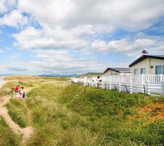 A view from our holiday homes at Barmouth Bay showing the direct access to the beach. image