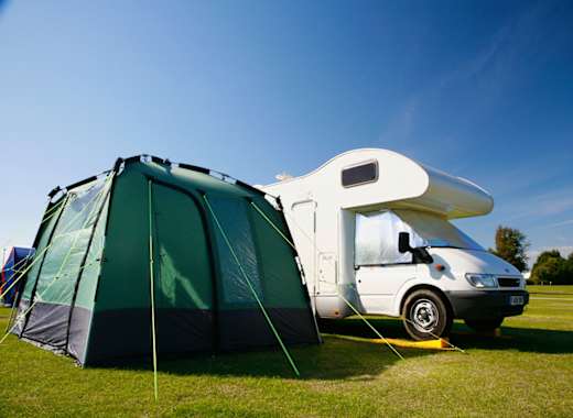 A tent and tourer in one of our holiday parks.