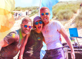 Three people enjoying our awesome events, the Colour Festival. image